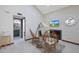 A bright living room featuring fireplace, high ceilings, cozy seating, and a neutral color palette at 3441 N 31St St # 118, Phoenix, AZ 85016