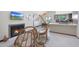 Bright living room with fireplace, cozy seating, and view of the modern kitchen at 3441 N 31St St # 118, Phoenix, AZ 85016