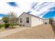 Back of the house with desert landscaping and walkway at 3480 N 307Th Dr, Buckeye, AZ 85396