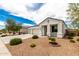 Exterior of home with well-manicured desert landscaping at 3480 N 307Th Dr, Buckeye, AZ 85396