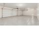 Spacious two car garage with epoxy flooring and automatic doors at 3480 N 307Th Dr, Buckeye, AZ 85396