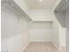 Spacious walk-in closet with carpet and multiple racks at 3480 N 307Th Dr, Buckeye, AZ 85396