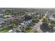 Expansive aerial view showcases a lush, established neighborhood with mature trees and diverse home styles near the city at 3653 E Highland Ave, Phoenix, AZ 85018