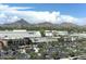 Scenic view of a city with mountains in the background from a rooftop location at 3653 E Highland Ave, Phoenix, AZ 85018