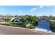 Attractive single-story home with a well-kept lawn, mature trees, and a covered garage at 3653 E Highland Ave, Phoenix, AZ 85018