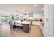 Spacious kitchen featuring a large center island with barstool seating and an open layout at 3653 E Highland Ave, Phoenix, AZ 85018
