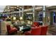 A luxurious hotel lobby with comfortable seating, stylish decor, and ambient lighting at 3653 E Highland Ave, Phoenix, AZ 85018