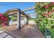 Inviting outdoor kitchen and living area, perfect for entertaining guests in style at 3653 E Highland Ave, Phoenix, AZ 85018