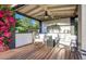 Stylish outdoor kitchen with modern appliances and comfortable seating, great for outdoor dining at 3653 E Highland Ave, Phoenix, AZ 85018