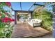 Relaxing outdoor space with a cozy swing and comfortable seating, ideal for enjoying the fresh air at 3653 E Highland Ave, Phoenix, AZ 85018