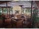 Cozy outdoor patio with heaters and comfortable seating, perfect for relaxing at 3653 E Highland Ave, Phoenix, AZ 85018