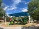 Playground with covered play area, including slides, climbing features, and colorful elements at 3653 E Highland Ave, Phoenix, AZ 85018