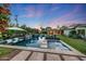 Stunning backyard pool and spa with lush landscaping, perfect for relaxing evenings under the stars at 3653 E Highland Ave, Phoenix, AZ 85018