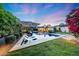 Lovely pool and landscaped backyard, perfect for outdoor relaxation and entertainment at 3653 E Highland Ave, Phoenix, AZ 85018