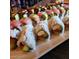 Platter of sushi rolls featuring avocado, tuna, rice, seaweed and a white plate at 3653 E Highland Ave, Phoenix, AZ 85018