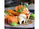 Exquisite close-up of a taco with lobster and decorative sprouts, showcasing culinary artistry at 3653 E Highland Ave, Phoenix, AZ 85018