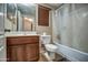 Cozy bathroom features a shower-tub combo, toilet, and a single sink vanity at 40437 W Robbins Dr, Maricopa, AZ 85138