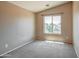 Neutral bedroom featuring carpet, one window and vaulted ceilings at 40437 W Robbins Dr, Maricopa, AZ 85138