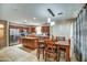 A large kitchen with an island, stainless steel appliances, and tile flooring at 40437 W Robbins Dr, Maricopa, AZ 85138