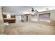 Open-concept living area with kitchen view, recessed lighting, and a ceiling fan at 40437 W Robbins Dr, Maricopa, AZ 85138