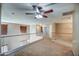 Bright loft area with carpet, providing flexible space for a variety of uses and activities at 40437 W Robbins Dr, Maricopa, AZ 85138