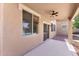 Covered patio with a ceiling fan overlooking the backyard with an in-ground swimming pool at 4222 E Torrey Pines Ln, Chandler, AZ 85249