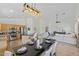 Stylish dining area adjacent to the kitchen and living room, perfect for entertaining guests at 4222 E Torrey Pines Ln, Chandler, AZ 85249