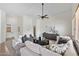 Bright and airy living room featuring vaulted ceilings, modern decor, and comfortable seating at 4222 E Torrey Pines Ln, Chandler, AZ 85249