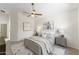 Comfortable main bedroom with neutral decor, carpeted flooring, and coordinated nightstands and lamps at 4222 E Torrey Pines Ln, Chandler, AZ 85249