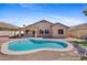 Backyard featuring a private in-ground pool, gravel landscaping, and mature trees at 4222 E Torrey Pines Ln, Chandler, AZ 85249