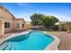 A private in-ground pool with a stone patio and gravel landscaping creates a backyard oasis at 4222 E Torrey Pines Ln, Chandler, AZ 85249