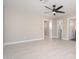 The bedroom features neutral paint and flooring and access to multiple rooms at 4506 W Golden Ln, Glendale, AZ 85302