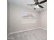 This bedroom features carpet flooring, neutral walls, and a window for plenty of natural light at 4506 W Golden Ln, Glendale, AZ 85302