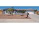 Charming single-story home with low-maintenance desert landscaping and a welcoming two-car garage at 4506 W Golden Ln, Glendale, AZ 85302