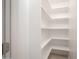 This pantry features multiple shelves for ample storage at 4506 W Golden Ln, Glendale, AZ 85302