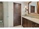 Well-lit bathroom features a beautiful vanity with ample storage and decorative accents at 4949 E Lincoln Dr # 11, Paradise Valley, AZ 85253