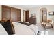 Comfortable main bedroom features a television, sitting area, and rustic wooden accents at 4949 E Lincoln Dr # 11, Paradise Valley, AZ 85253