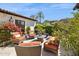 Serene patio area with comfortable seating, lush greenery, and a charming outdoor ambiance at 4949 E Lincoln Dr # 11, Paradise Valley, AZ 85253
