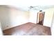 Bedroom with ceiling fan and hallway at 5002 W Christy Dr, Glendale, AZ 85304