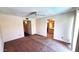 Bedroom with ceiling fan and a view to the bathroom at 5002 W Christy Dr, Glendale, AZ 85304