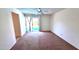 Bedroom with ceiling fan and sliding glass doors that lead to a swimming pool at 5002 W Christy Dr, Glendale, AZ 85304