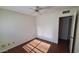 Bedroom featuring wood floors and a ceiling fan at 5002 W Christy Dr, Glendale, AZ 85304