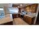 Kitchen with granite countertops, stainless appliances and wooden cabinetry at 5002 W Christy Dr, Glendale, AZ 85304