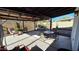 Covered patio featuring an outdoor dining area and furniture at 5002 W Christy Dr, Glendale, AZ 85304
