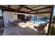 Patio featuring a metal shade structure and backyard pool at 5002 W Christy Dr, Glendale, AZ 85304