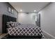 Bedroom featuring recessed lighting, gray walls, and a modern comforter at 519 E El Camino Dr, Phoenix, AZ 85020