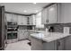 Modern kitchen with sleek countertops, stylish backsplash, and stainless steel appliances for culinary enthusiasts at 519 E El Camino Dr, Phoenix, AZ 85020