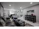Open-concept living area featuring a modern dining area, comfortable seating and plenty of natural light at 519 E El Camino Dr, Phoenix, AZ 85020
