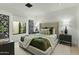 Comfortable bedroom with a large window and a cozy, inviting atmosphere at 5318 N 24Th Pl, Phoenix, AZ 85016