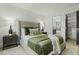 Serene bedroom featuring soft lighting and a view into the en suite bathroom at 5318 N 24Th Pl, Phoenix, AZ 85016